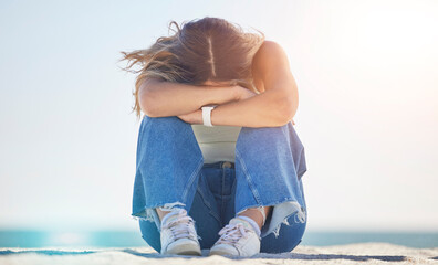 Sad woman, stress or depression by beach, ocean nature or sea environment and bipolar, psychology...