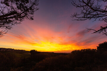 A beautiful sunset skies over the Pacific Ocean in California
