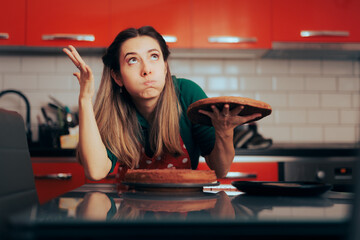 Stressed Baker Feeling Mind blown Slicing a Cake for the First Time. Desperate mom trying to...