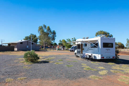 Outback, Australia - November 12, 2022: Motorhome Camper Van On Road Trip. People On Travel Vacation Adventure. Tourists In Rental Campervan Road Trip Looking At The Vast Australian Outback Landscape