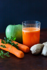 healthy smoothie with carrot, apple and  ginger