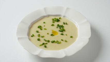 Vichyssoise, classic French chilled cream soup  - potato leek, and  onion topped with chopped chives