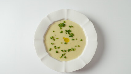 Vichyssoise, classic French chilled cream soup  - potato leek, and  onion topped with chopped chives