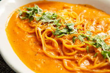 pasta with tomato sauce and basil