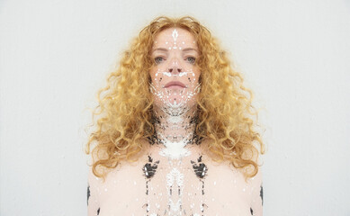 extraordinary artistic portrait face symmetrical mirrored of a sexy mature redhead woman, in black...