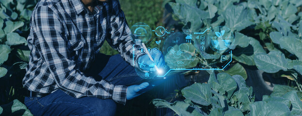 Selective focus. Architect team planning design apply renewable or solar energy on architectural building model with virtual reality technology hologram. Alternative green energy in future concept..