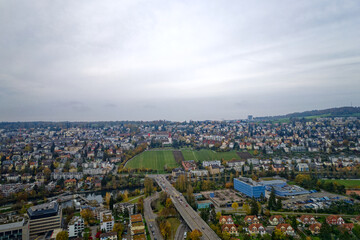 Aerial view of City of Zürich with skyline and panoramic view on a gray and cloudy late afternoon. Photo taken November 12th, 2022, Zurich, Switzerland.