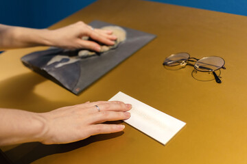 Female hands touches exposition in museum. Convex exhibit for visually impaired and blind people....