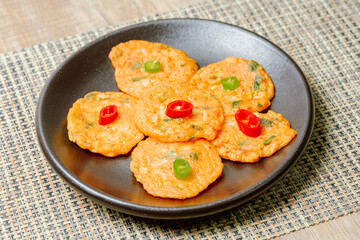 Kimchijeon, Korean Kimchi Pancake food : Slices of well-fermented kimchi mixed into a flour batter and pan- fried. Finely chopped pork, squid, and clam meat may be added to the batter as well.