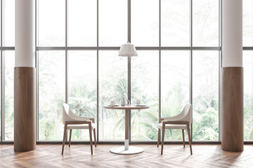 Fototapeta na wymiar Modern cafe interior with two seats and table near panoramic window