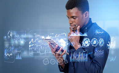 African businessman with tablet in hand, big business data analysis