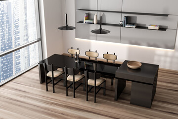 Top view of living room interior with eating table and chairs, shelf and window