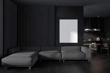 Front view on dark studio interior with empty white poster