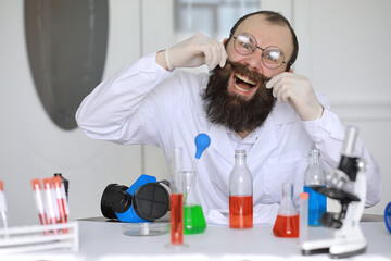 Chemist crazy. A mad scientist conducts experiments in a scientific laboratory. Performs research...