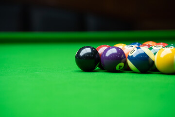 Pool balls on a snooker table