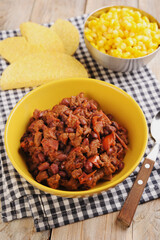 Chili con carne with corn and corn chips