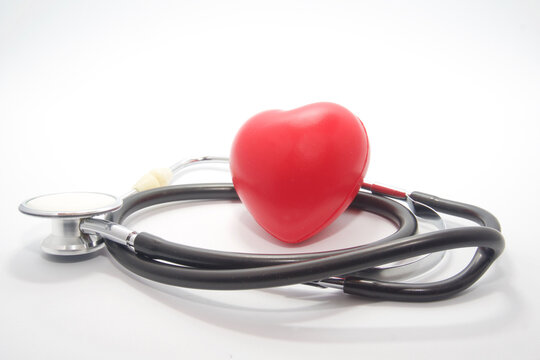 Fonendo and rubber heart isolated on white background. Heart health concept