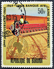 Cancelled postage stamp printed by Burundi, that shows Agriculture, 5th anniversary of African...