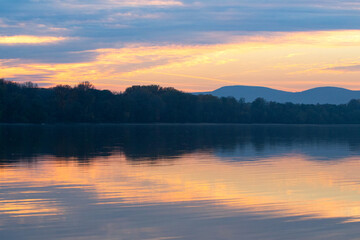 Obraz premium Beautiful landscape, sunsett on the river Danube Hungary with colorful sky reflection