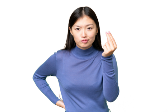 Young Asian woman over isolated chroma key background making Italian gesture