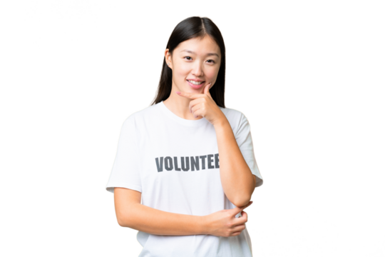 Young volunteer woman over isolated chroma key background happy and smiling