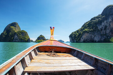 Traditional wooden boat in beautiful tropical bay on Koh Phi Phi Island, Thailand, Asia. Summer...