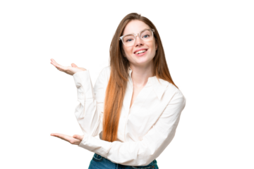 Young pretty woman over isolated chroma key background extending hands to the side for inviting to come