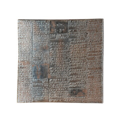 Cuneiform tablet isolated on white