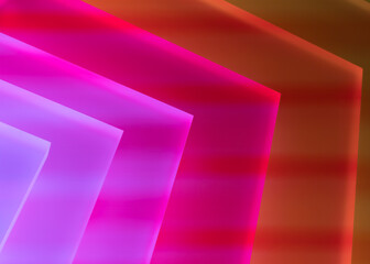 The neon  colored light  tablets in a dark room