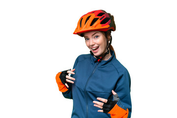 Young cyclist woman over isolated chroma key background making guitar gesture - obrazy, fototapety, plakaty