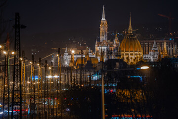 Amazing photo about the budapest night with the Mathias churc and the Hungarian Parliament.