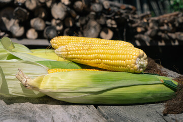 Peeled corn cobs on a wooden table