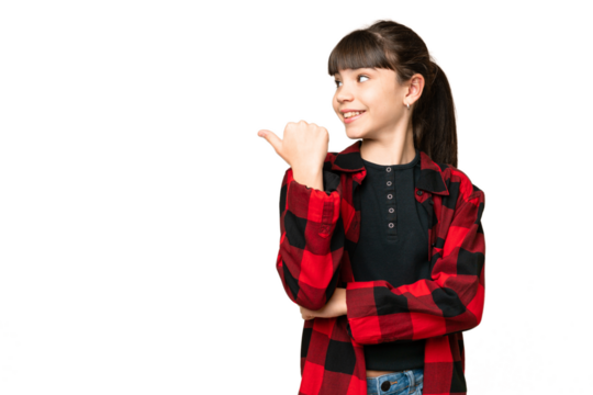 Little girl over isolated green chroma key background pointing to the side to present a product