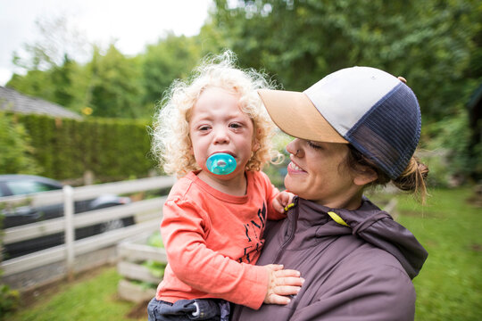 Mother holding baby daughter, Chilliwack, British Columbia, Canada