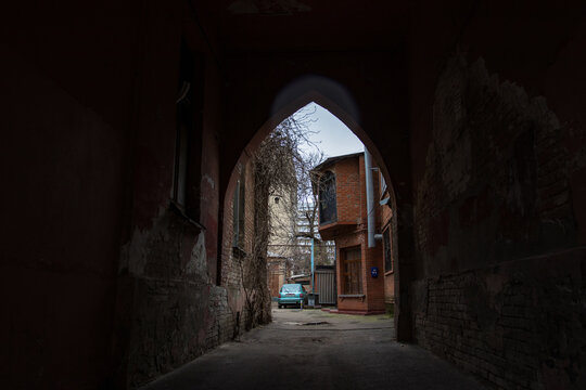 old arched passage to the courtyard