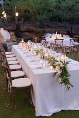 Amazing view on the decorated wedding table in the evening in Greece