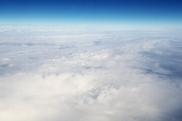 Fototapeta na wymiar Mountain range and white clouds in blue sky at day.