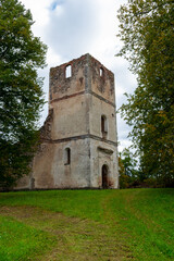 Fototapeta na wymiar landscape with old church ruins, colorful trees in autumn, Ergeme church ruins