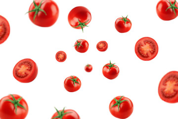 Falling tomato isolated on white background, selective focus