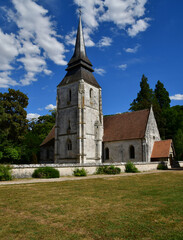 Fototapeta na wymiar Amfreville sur Iton, France - august 8 2022 : Notre Dame church in village centre