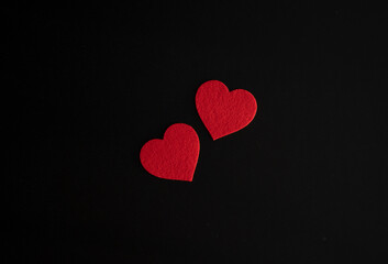 Valentine's day and heart shapes on black background