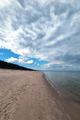 Sandy coast of the Baltic Sea. Rest on the sea. Active recreation.