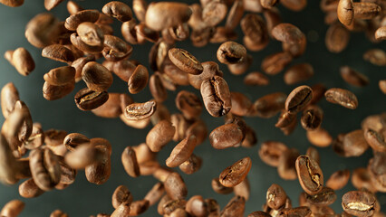 Coffee beans flying in the air in freeze motion.