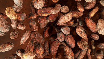 Cocoa beans flying in the air in freeze motion.