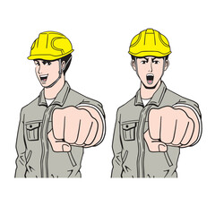 拳を突き出す日本人の工事現場員