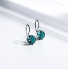 Elegant jewelry set. Jewellery set with gemstones. Jewelry accessories collage. Product still life concept. Ring, necklace and earrings.