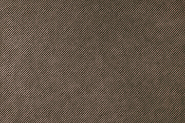 Texture background of velours brown fabric. Upholstery velveteen texture fabric, corduroy furniture textile material, design interior, decor. Ridge fabric texture close up, backdrop, wallpaper.