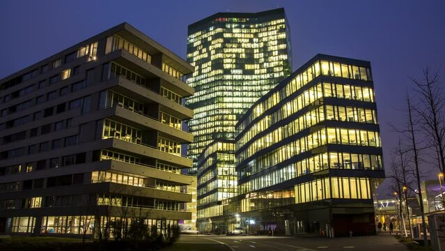 Office building exterior time lapse at night. Business city office concept. Prime tower Zurich Time lapse video at night