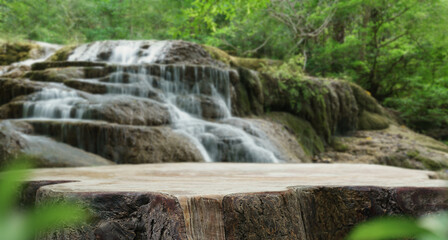 wood table top podium in outdoors waterfall green lush tropical forest nature background.organic...