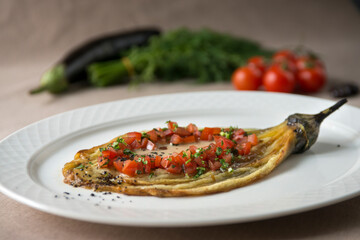 baked eggplant with vegetables and herbs